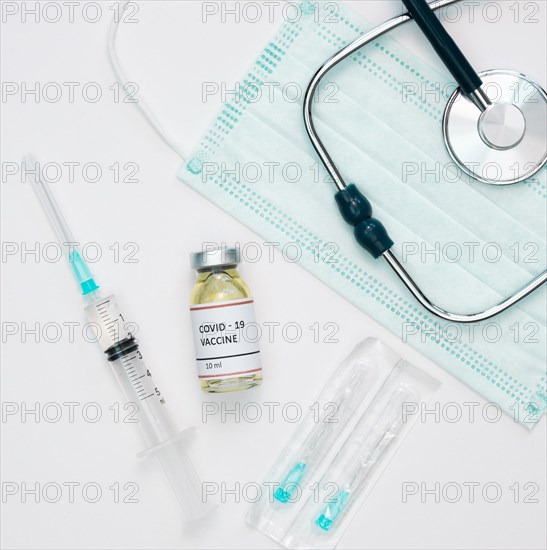 Flat lay vaccine with syringe stethoscope