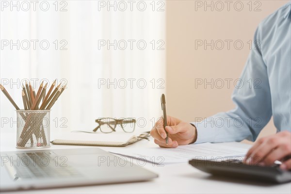 Office desktop with laptop business man