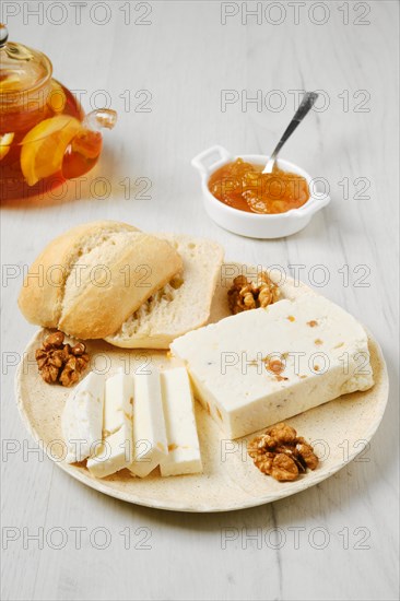 Healthy rustic breakfast. Homemade curd cheese with raisin and walnut