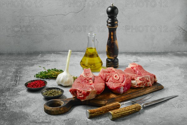 Raw lamb leg cut as a steak. Slices of shank