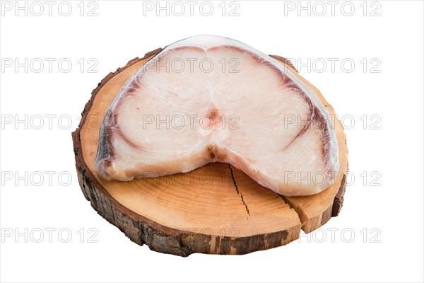 Frozen blue shark steak isolated on white background