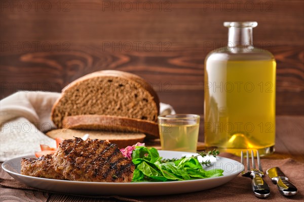 Grilled beef cutlet with fresh salad