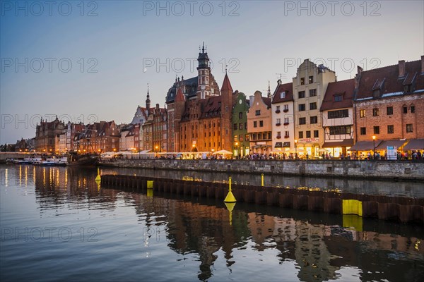 Hanseatic league houses on the Motlawa river at sunset