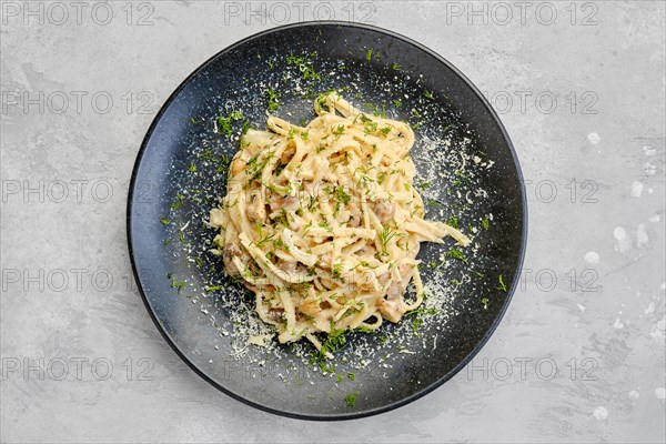 Top view of pasta with honey agarics