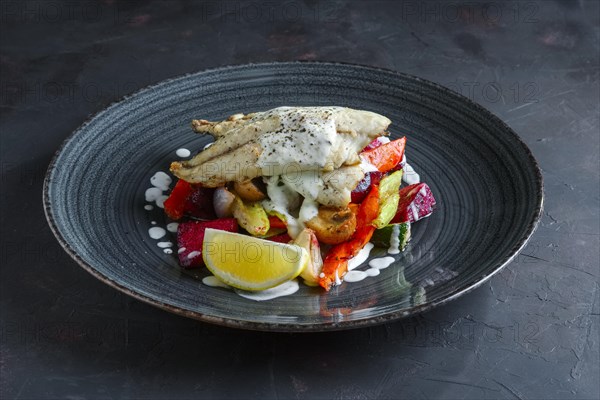 Fried fish fillet with grilled beetroot