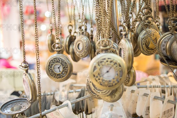 Set of retro styled pocket watches hanging