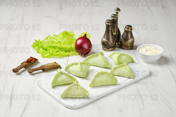 Frozen dumplings with spinach