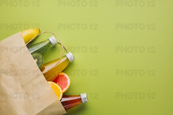 Flatlay paper bag with fruit juices
