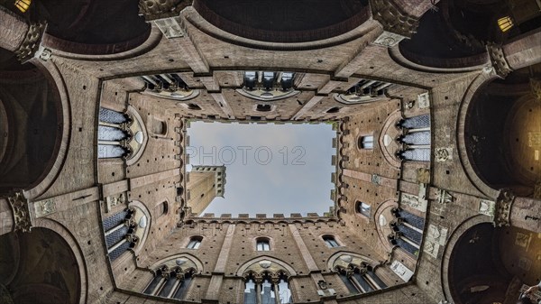 View from the courtyard to the Torre del Mangia