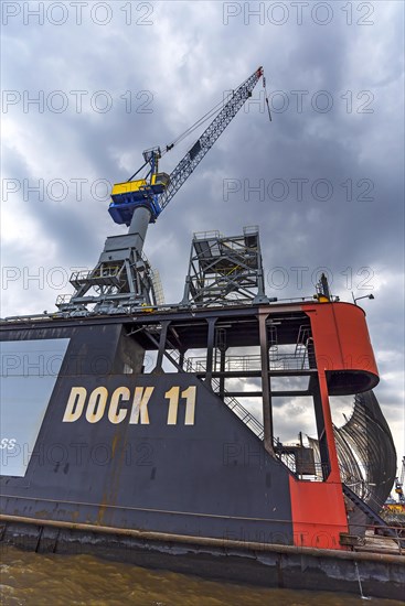 Ship lifting crane on the dock at a shipyard in the port of Hamburg