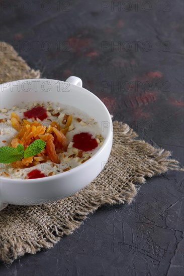 Plate of oatmeal with dried apricots