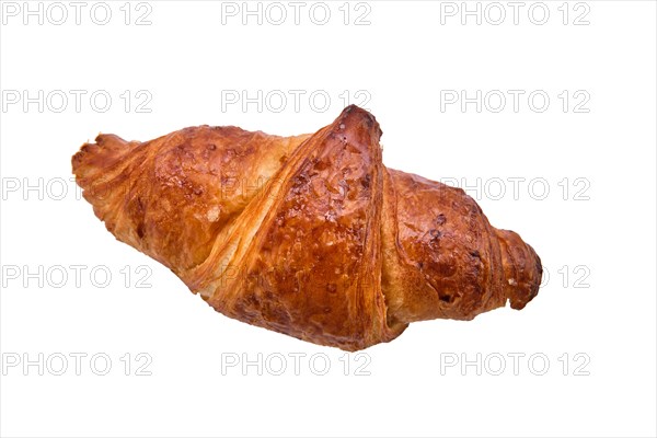 Fresh and tasty croissant over white background