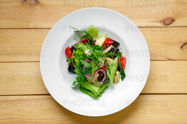 Overhead view of salad with onion