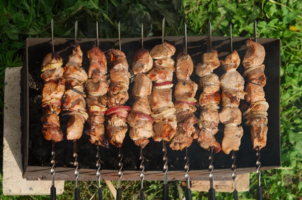 Process of cooking shashlik from pickled meat outdoor