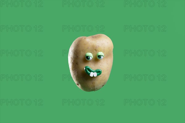 Funny potato with cute sticker