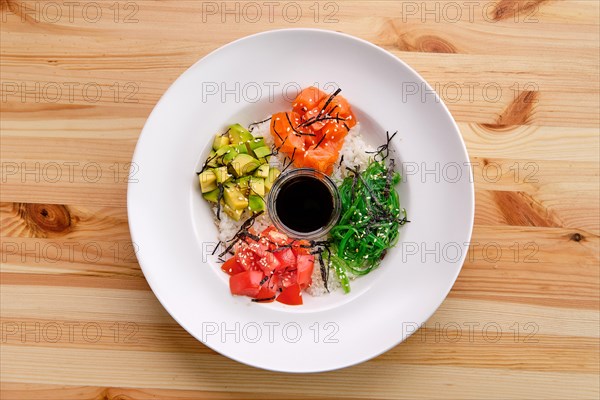 Salmon sashimi rice bowl with avocado