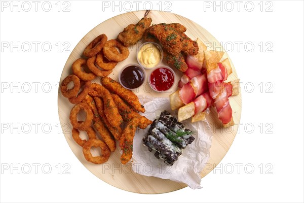 Big set of snack for beer with onion rings and carrot in breading