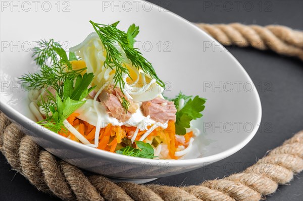 Plate with tuna salad with eggs