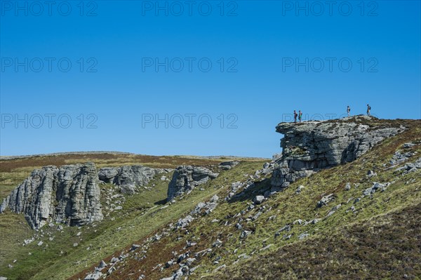 Hikers on a rock