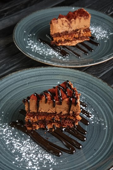 Two pieces of puffy chocolate cake with souffle