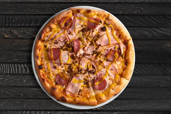 Overhead view of pizza on the table