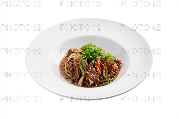 Wok with beef and green beans isolated on white background