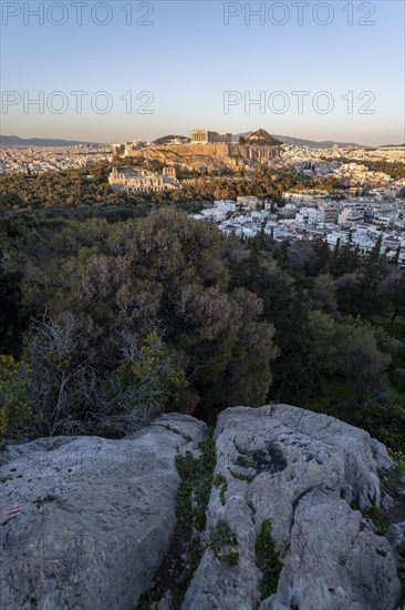 View from Philopappos Hill over the city at sunset