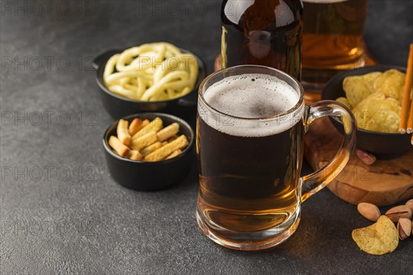 High angle beer mug snacks