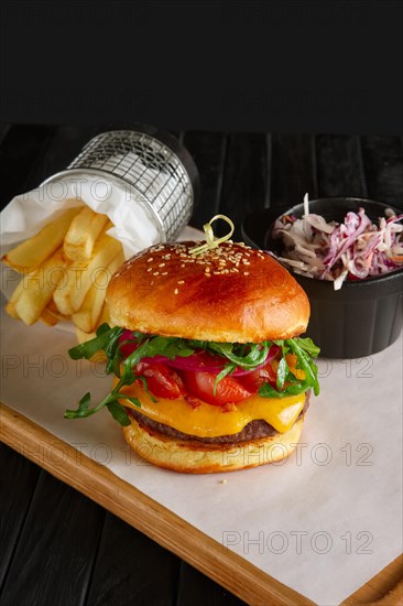 Juicy beef burger with lingonberry sauce