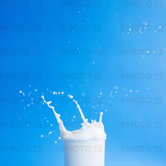 Pouring milk out glass