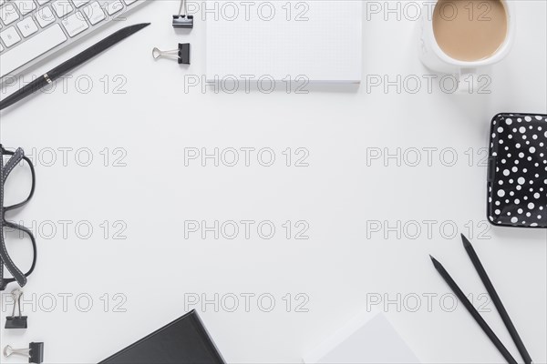 Stationery near glasses keyboard. Resolution and high quality beautiful photo