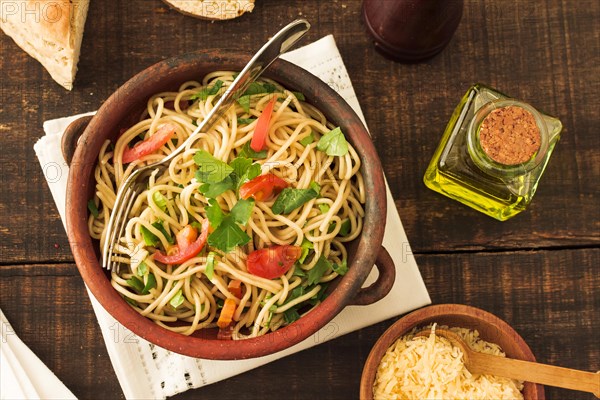 Tomatoes coriander toppings spaghetti pasta earthenware. Resolution and high quality beautiful photo