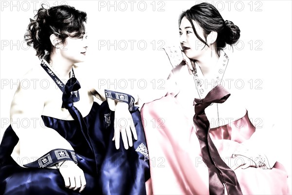 Two seated woman in Korean traditional costume