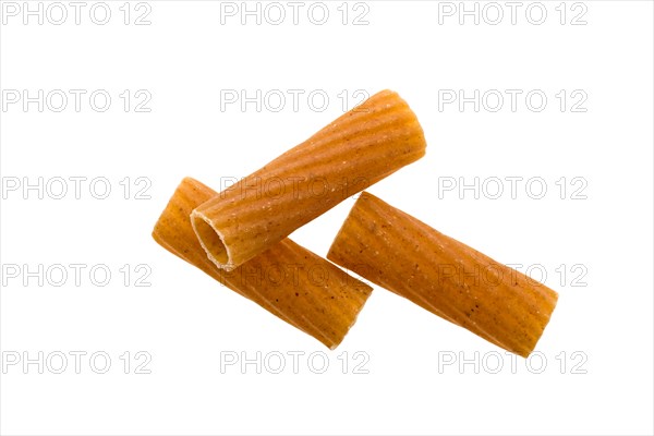Tot view of tortiglioni grooved helical tube pasta isolated on white background