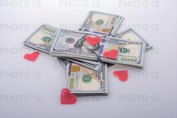 Red hearts and banknote bundle of US dollar