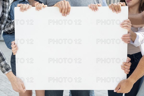 Group protesters together with mock up