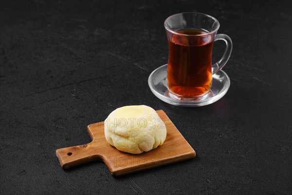 Sweet dessert mochi with banana and chocolate with fruit tea