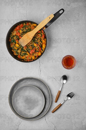 Overhead view of spaghetti with spinach
