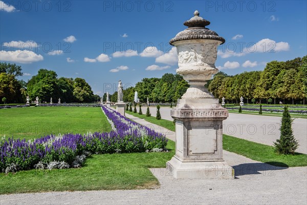 Baroque garden parterre with sculptures in the palace park of Nymphenburg Palace