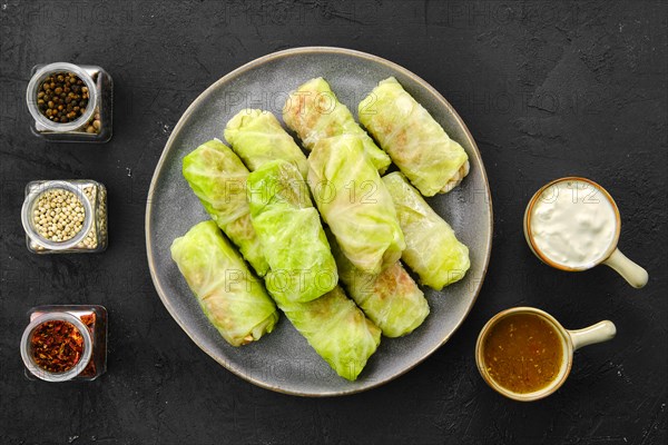 Top view of rolled cabbage leaves stuffed with ground meat