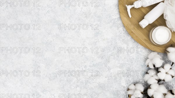 Flat lay cream flowers with copy space