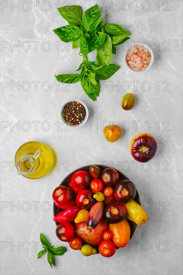 Vertical composition with various types of tomatoes