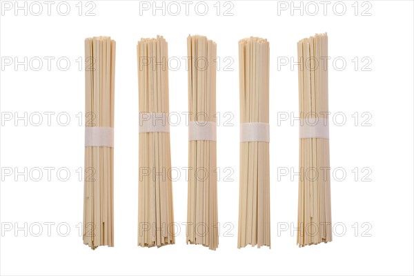 Dry Udon wheat noodles isolated on white background