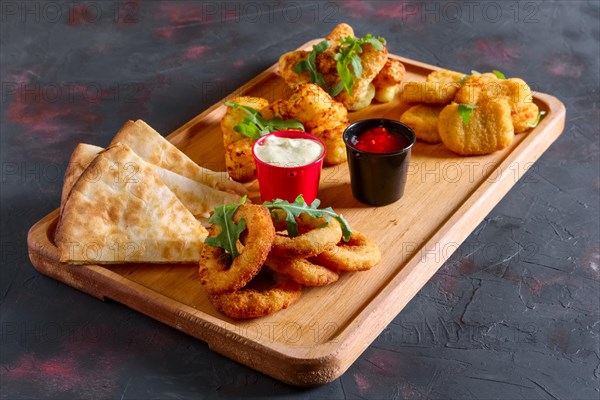 Wooden plate with snack for beer