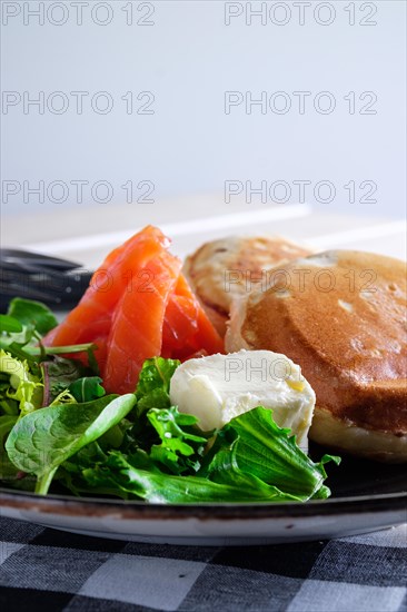 Flapjacks with salmon and fresh salad