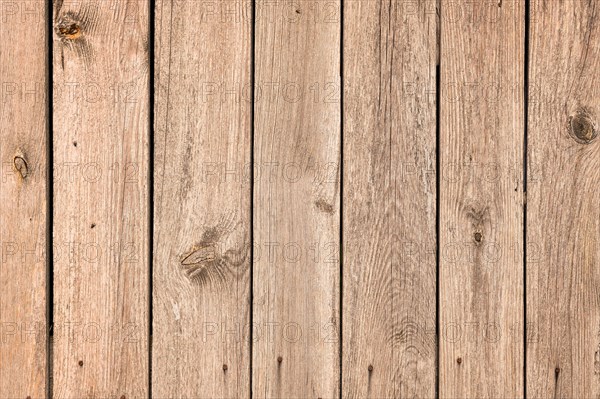 Vertical light brown wooden planks background