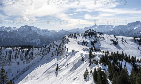 View of mountain panorama and summit of Hochgern in winter