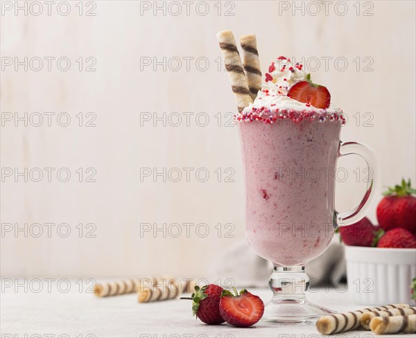 Front view strawberry milkshake with copy space