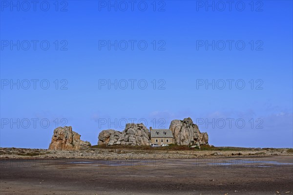 Country house between rocks near Le Gouffre