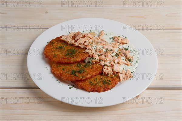 Potato pancakes with chopped salmon